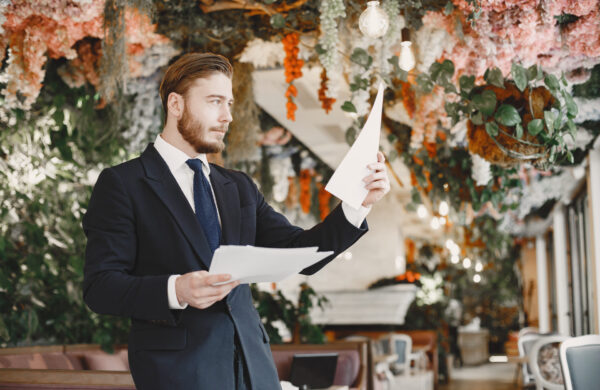 The Ultimate Guide to Event Planning and Services with PartyBox Oklahoma - guy black suit male restaurant