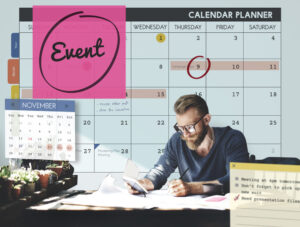 Elevate Your Corporate Events with Premier MC and DJ Services in OKC 2 overwhelmed event planner surrounded by paperwork and tools